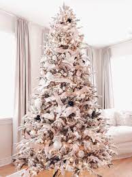 Given the fact, the flocked tree discharges a whitish illumination offering you a complete snowy and wintry. 9 Foot Queen Flock Artificial Christmas Tree 1100 Led Lights King Of Christmas