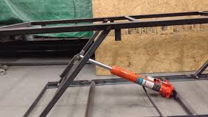 Hydraulic jack available from harbor freight and is relatively cheap. How To Build A Motorcycle Lift Table
