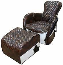 Get cozy in your living room space with an arm chair or chaise lounge chair. Casa Padrino Genuine Leather Living Room Armchair With Ottoman Dark Brown White Black Silver Living Room Furniture Genuine Leather Furniture