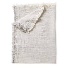 Lightweight Throw Blankets That Are Perfect For Summer Bhg