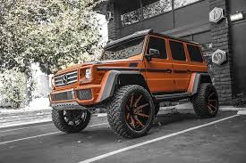 Kylie Jenner Poses Next To Her Custom Mercedes Benz G550 4 4 Carscoops Custom Mercedes Benz Custom Mercedes Mercedes 4x4