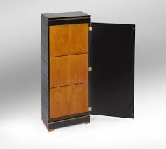 Amazing gallery of interior design and decorating ideas of shoe cabinet in closets, dens/libraries/offices, laundry/mudrooms by elite interior. Shoe Cabinet Desaive Design