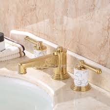 Decorate your bathroom shiny and luxury. Luxury Polished Brass Three Hole Gold Bathroom Sink Faucet