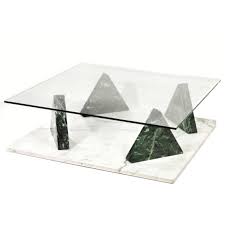 Easy to assemble and easy to style, the tempered glass top, metal shelf and blackened bronze finish make it the perfect addition to your living room or den ensemble. Ettore Sottsass Jaipur Coffee Table Marble Base With Glass Top 1stdibs Com Glass Coffee Table Coffee Table Furniture Glass Top Coffee Table
