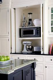 Hide A Slide Out Coffee Bar Or Kitchen Appliances Behind Folding Doors Kitchen Design Kitchen Remodel Kitchen