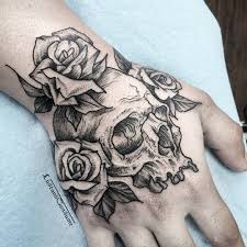 Skull And Roses Tattoo By Thistleandsnowstudio Lustandconsume On Instagram Skull And Roses Banger For Th Skull Rose Tattoos Hand Tattoos Rose Hand Tattoo