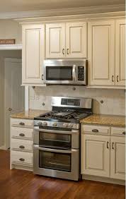 Secretly love cream kitchen cabinets paint cabinets wall cream colors cream kitchen cabinets gray with cream cabinets. Restored Kitchen Cabinets Beige Kitchen Cabinets Beige Kitchen Antique Kitchen Cabinets