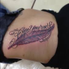 Air, flight, spirituality, freedom, feelings that want to represent those who choose a feather for a tattoo. Free Yourself Script Feather Tattoo Lio