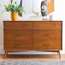 This chest of drawers is made from sturdy engineered wood in a natural walnut finish. West Elm X Pbt Mid Century 6 Drawer Wide Dresser Pottery Barn Teen
