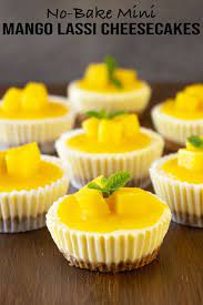 Mini Mango Lassi Cheesecakes No Bake El Mundo Eats Recipe Desserts Mini Cheesecakes Dessert Recipes