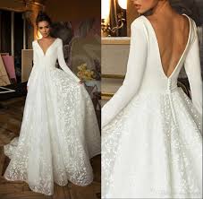 A long sleeve gown adds a touch of romance and elegance, as well as even more area for lace, embroidery, and beading to really make your winter wedding dress your own. Discount Boho Modern Long Sleeves A Line Wedding Dresses V Neck Backless Lace Sweep Train Bohemian Wedding Dress Bridal Gown Vestido De Novia Designer Gowns Dresses For A Wedding From Allanha 133 87