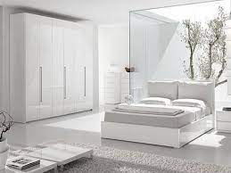 The pieces are made of solid rubberwood and painted white, and the shiny rounded pulls add a touch of modern minimalism. 20 Modern White Bedroom Magzhouse
