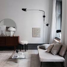 Quelques Luminaires Bien Choisis Et La Magie Opere Lampe A Poser Atollo Applique De Serge In 2020 House Styling Interior Parisian Living Room House Decor Modern