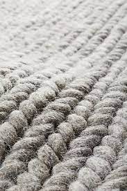 Inspired By Traditional Hand Knitting Cable S Hand Woven Pattern Is Centuries Old The Rug S Natural Thick Core 100 Wool Yarns Rugs Solid Rugs Braided Rugs