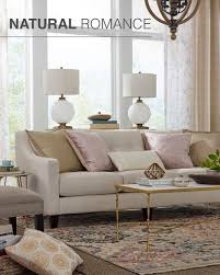 Beige Couch With Throw Pillows With Large Window Behind It With 2 White Table Lam Couches Living Room Apartment Beige Couch Living Room Living Room Sofa Design