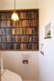 本棚の壁紙で広々みせるトイレ home decor home decor