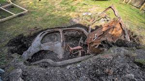 Gardener finds car buried as a time capsule in 1964