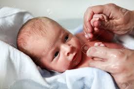 You can give the baby a bath in a flat surface like a changing. Newborn Baby Boy Only Few Hours Old Taking First Bath Stock Photo Picture And Royalty Free Image Image 18909419