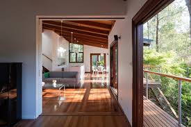 The oh house was designed by japanese firm atelier tekuto and was built on an irregularly shaped lot 1.5 m lower than street level. Beach House Expansion With Triangular Roofline