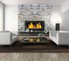 Stacked stone fireplace installations consistently convey the feeling of a connection to nature. Ledger Stone Ceramic Tileworks Minnesota