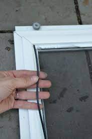 How do you fix screen doors? How To Replace The Screen In A Screen Door Or Window Diy Screen Door Screen Door Screen Door Replacement