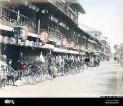 1880s Japan - Matsushima Brothels, Osaka ] — Rickshaws parked in front of  brothels in the Matsushima Yukaku (prostitution district) of Osaka.  Matsushima was created in 1868 (Meiji 1), nearby Osaka's