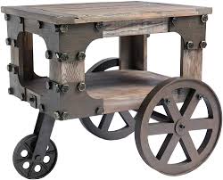 Small coffee table on wheels for the scandinavian home [from: Rustic Country Coffee Table With Metal Wheels And Storage Tv Cabinet End Table For Living Room