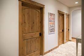 Interior Doors Knotty Alder Two Panel Doors With An Arched Top And Oil Rubbed Bronze Hardware Make A Rustic Doors Interior Wood Doors Interior Doors Interior
