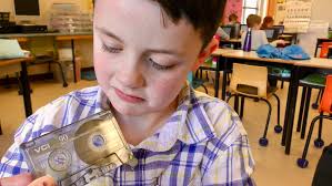 Technology from the 'olden days': P.E.I. students try to play a cassette  tape
