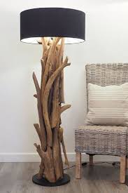 Rustic tree branch glass bubble chandelier lighting bar retro vintage light lamp. 38 The Natural Touch Decoration Of Tree Branch Lights Housemypedia Unusual Furniture Home Decor Driftwood Lamp