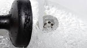 How To Fix Your Slow Shower Drain ‐ Woolf Plumbing