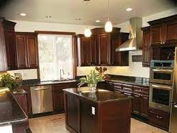If your kitchen countertops are worn out and dull, then it can cause your whole space to look dark and dingey. Dark Wood Cabinets Kitchen To Brighten Up My Dark Living Room And Kitchen Apar Dark Wood Kitchen Cabinets Clean Kitchen Cabinets Wood Kitchen Cabinets