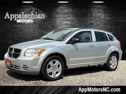 Image result for Bright Silver 2009 Caliber