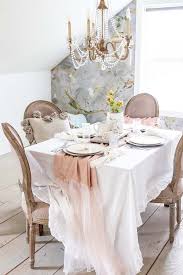 I love the look of a grouping of candles on either side of my centerpiece. Spring Table Setting Decorating Ideas Hallstrom Home