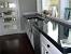 Modern White Kitchen With Concrete Countertops