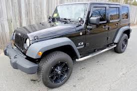 Image result for Brilliant Black 2009 Jeep