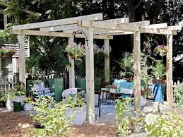 To get the patio ready for the columns, drill a 1 hole in the brick using a hammer drill. How To Build A Wood Pergola Hgtv