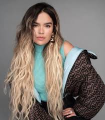 Karol g was at the center of controversy after she shared a photo of her black and white dog in her black lives matter post. Karol G Wiki Parents Net Worth Dating Boyfriend Age Height