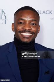 CJ Faison, Jasmine Faison and son attend the Comcast Xfinity and... News  Photo