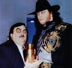 The Undertaker Began His Career With Paul Bearer Becoming One Of The Most Feared Wrestlers His Character Wwf Superstars Undertaker Wwe Professional Wrestling