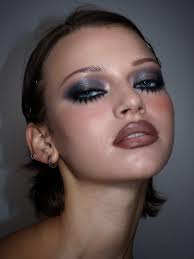 Feline Eyes and glossy sculpted lips