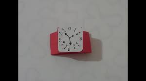 7) con ayuda del punzón hacen un agujero en el centro de la esfera del reloj y en las manecillas, y pasan un encuadernador uniendo las tres piezas. Como Hacer Un Reloj De Papel Youtube