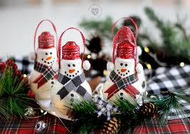 I hand painted this ornament then added felt ears and a fabric hat. Shatter Proof Light Bulb Snowman Christmas Craft