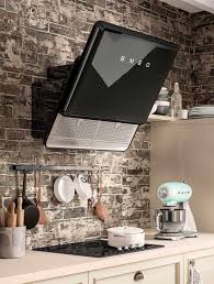 Black Smeg Cooker Hood Interesting Design I Would Love It More If It Was Flat Against The Wall Smeg Kitchen Appliances Smeg Kitchen Kitchen Hood Design