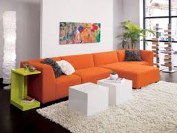 We say you can never have too much grey! Pin By Angie Jula On For The Home Living Room Orange Orange Couch Orange Furniture Living Room