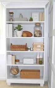 4 Tips To Style An Office Bookcase Marly Dice Bookcase Decor Office Bookcase Bookshelf Decor