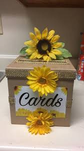 Sunflowers tied to table corners. Baby Shower Sunflower Card Box Diy Sunflower Baby Shower Invitations Sunflower Baby Showers Sunflower Party