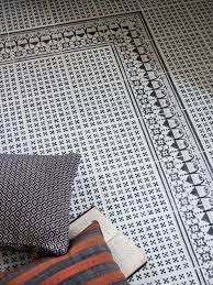Porcelain floor and wall tile draws inspiration from artisan cement tiles. Life In Black White With Fired Earth The House Directory