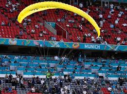 Greenpeace has apologised and munich police are investigating after a protester parachuted into the stadium and greenpeace said the paragliding protester was meant to fly over the stadium, when. Pxsf8jczvbv9zm
