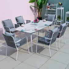 This set includes 2 captain chairs, 2 armless dining chairs, a bench and table that are perfect for entertaining. New Series Modern Outdoor 6 Rope Chairs And Glass Top Dining Table Set Buy Dining Tables Dining Tables For Garden Garden Rope Dining Chair With Outdoor Dining Table Product On Alibaba Com